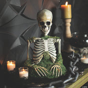 9-3-4-x-14-3-4-animated-mossy-skeleton-tabletop-halloween-decoration