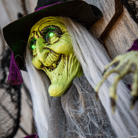 4 Ft. Hanging Animated Witch with Green Eyes Halloween Decoration | Horror-Shop.com