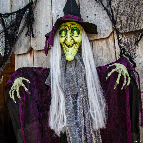 4 Ft. Hanging Animated Witch with Green Eyes Halloween Decoration